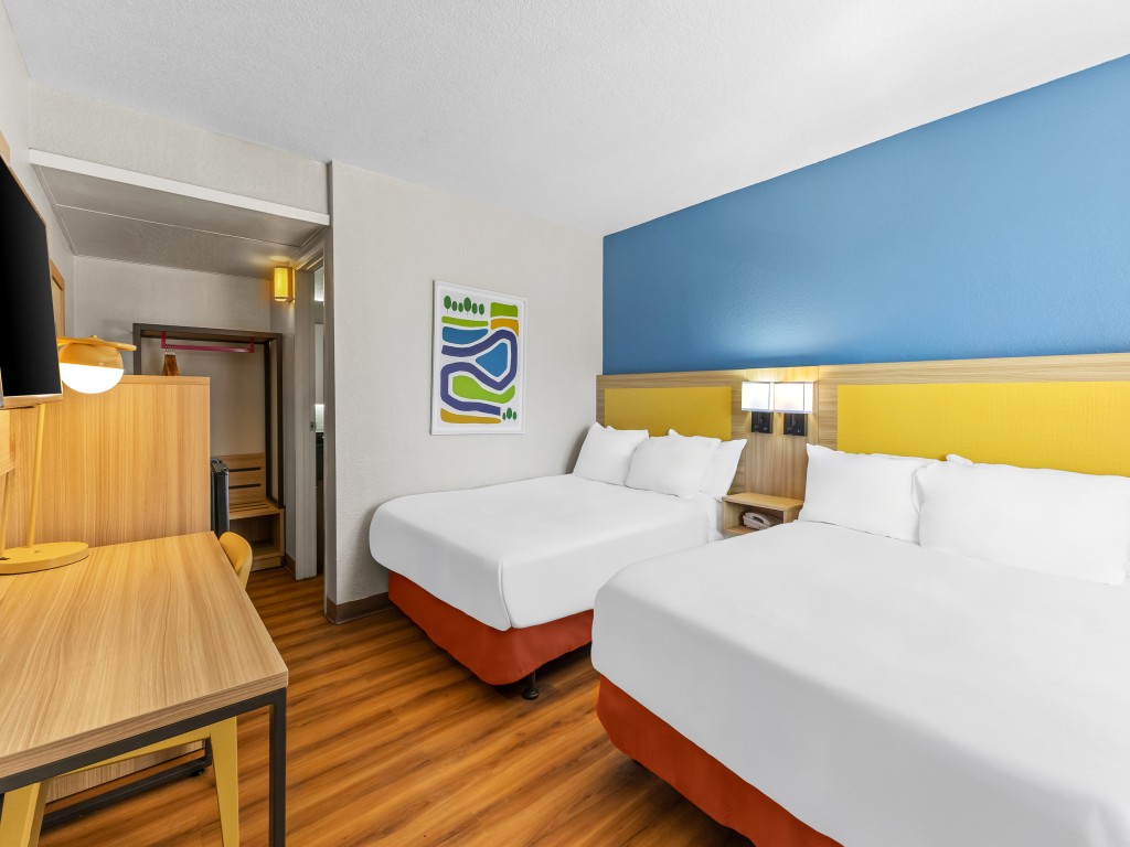 Hotel Room at Park Inn Wells with bright, modern decor and comfortable furnishings."